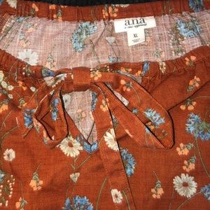 Floral loony sleeve shirt with front bow.